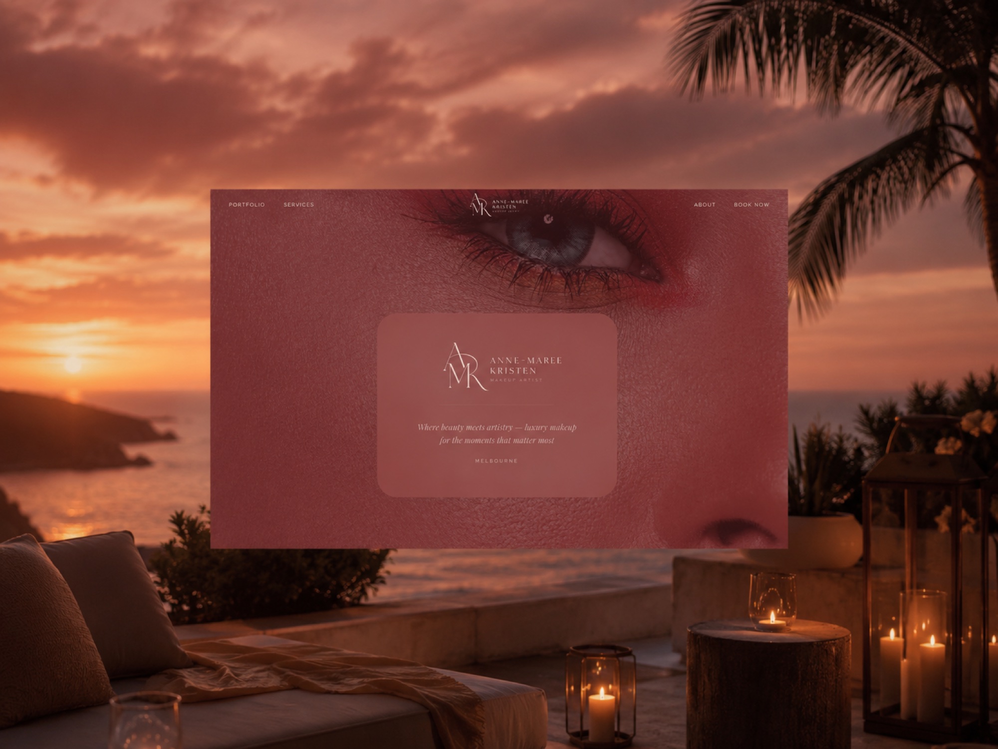 The AK Makeup Artistry website, the AMR monogram over a close-up beauty photograph, set against a coastal sunset
