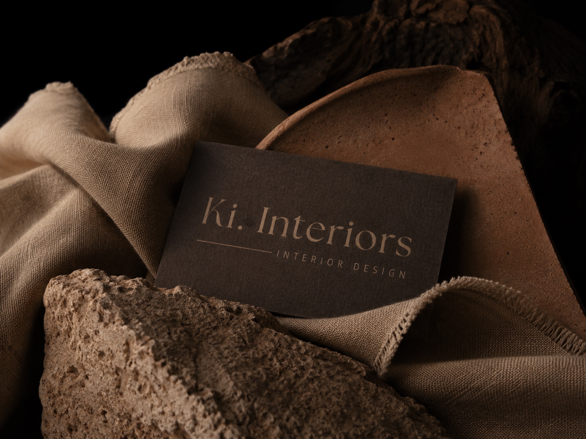 KI Interiors brand, business card in linen and travertine
